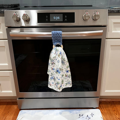 Stone Wash Blue Towel Holder, Displayed on Oven