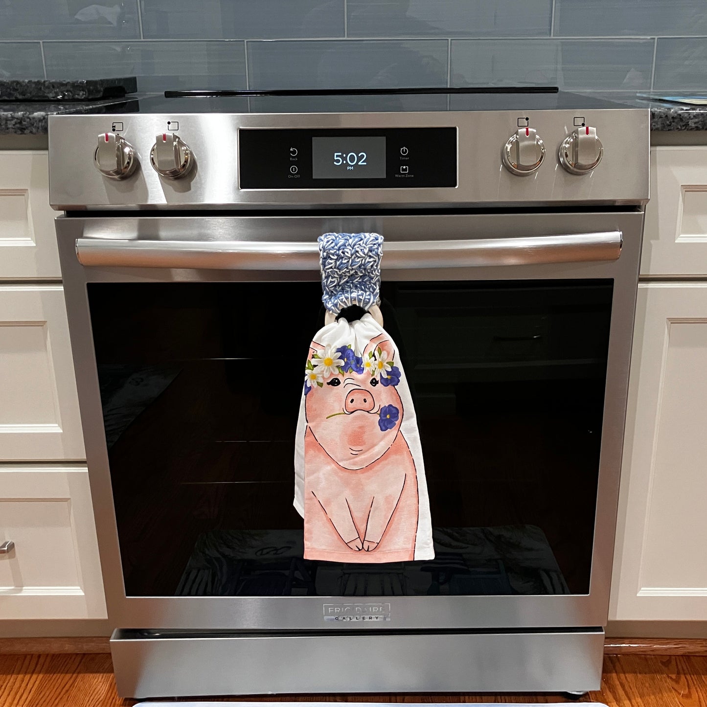 Stone Wash Blue and White Towel Holder, Displayed on Oven